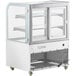 A white Avantco dry bakery display case with curved glass doors.