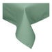 A seafoam green Intedge square tablecloth with a folded edge.