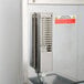 A Campus Products Silvershine countertop cutlery dryer/polisher machine with a metal door and vent.