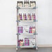A MetroMax i polymer shelving unit with boxes and bottles on it.
