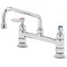 A chrome T&S deck-mounted pantry faucet with two handles and an 8" swing nozzle.