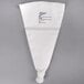 A white plastic bag with a black label reading "Ateco 334 8-Piece Stainless Steel Piping Tip Decorating Set"