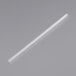 A clear straw on a gray surface.