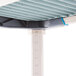 A MetroMax i 4-shelf polymer add-on shelving kit with white metal poles.
