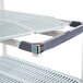 A MetroMax i 4-shelf polymer shelving kit with a grey metal shelf.