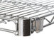 A metal Metro Super Erecta wire shelf with a metal clip.