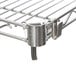 A Metro Super Erecta chrome wire rack shelf with metal clips.