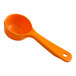 A Carlisle orange plastic measuring spoon.