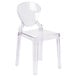 A clear plastic chair with a clear back.