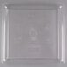 A clear plastic tray with lines and symbols.