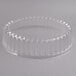 A clear plastic container with a clear plastic oval dome lid.