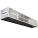 A metal air duct with a metal vent on it.