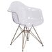 A Flash Furniture Alonza clear polycarbonate side chair with gold legs.