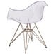 A clear plastic Flash Furniture Alonza side chair with gold legs.