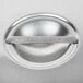 A Vollrath stainless steel cover for a stock pot with a metal handle.
