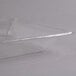 A Fineline clear plastic rectangular catering tray with a thin strip.