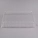 A clear plastic Fineline rectangular dome lid on a clear plastic container.