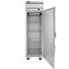 A silver Beverage-Air reach-in freezer with a solid door open.