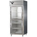 A stainless steel Continental reach-in refrigerator with half glass doors.