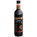 A close up of a dark brown DaVinci Gourmet Classic Iced Coffee Concentrate bottle.