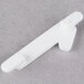 A close-up of a Ketchum Manufacturing white plastic number 1 deli tag insert.