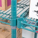 A Metro Super Erecta wire shelf with boxes on it.