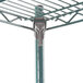 A Metroseal grey metal rack with a metal pole.