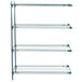 A green metal Metro Super Erecta wire shelving unit with three shelves.