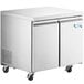 An Avantco stainless steel undercounter freezer with two doors on wheels.