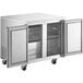 An Avantco stainless steel undercounter freezer with two doors open.