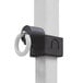 A black and white metal ring attached to a white pole on a Caravan Canopy.
