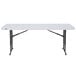 A white rectangular Lifetime folding table with black legs.
