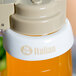 A Tablecraft white plastic salad dressing dispenser collar with beige lettering.