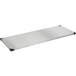 A Metro stainless steel shelf with black corners.