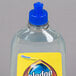 A bottle of SC Johnson Pledge Multi-Surface Floor Care Finish with a blue cap.