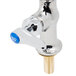 A silver T&S deck-mounted faucet with a blue lever handle.