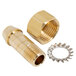 A close-up of a brass threaded nut.