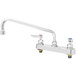 A chrome T&S deck-mounted workboard faucet with lever handles.
