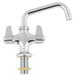 A chrome Equip by T&S deck-mounted faucet with lever handles.
