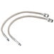 A white Equip by T&S deck-mounted faucet with two stainless steel hoses.