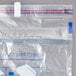A clear Ziploc plastic bag with a zipper and blue and red text.