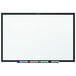 A Quartet whiteboard with a black frame.