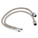 A close-up of two stainless steel braided hoses with a hose connector.