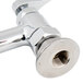 A T&S chrome deck-mounted faucet with lever handles.