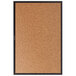 A Quartet cork board with black aluminum frame.
