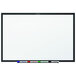 A Quartet whiteboard with a black frame.