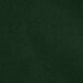 A close-up of a plain dark green Intedge cloth napkin.