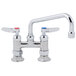 A T&S chrome deck-mounted faucet with two lever handles.