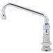 A chrome T&S deck-mounted faucet with lever handles.