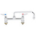 A T&S chrome deck-mounted faucet with lever handles.